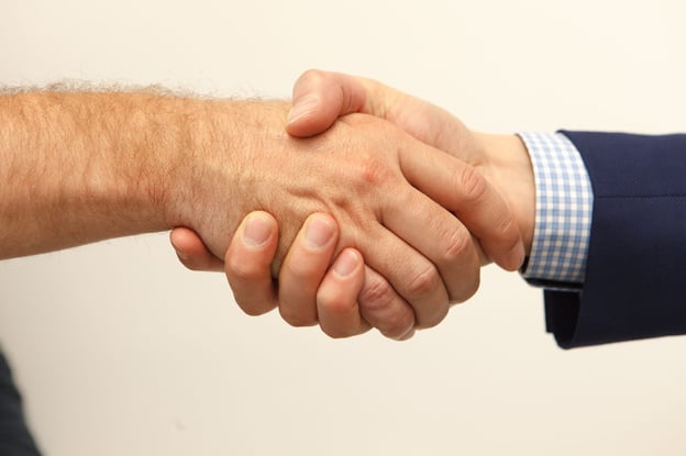 Closing Sales by shaking hands